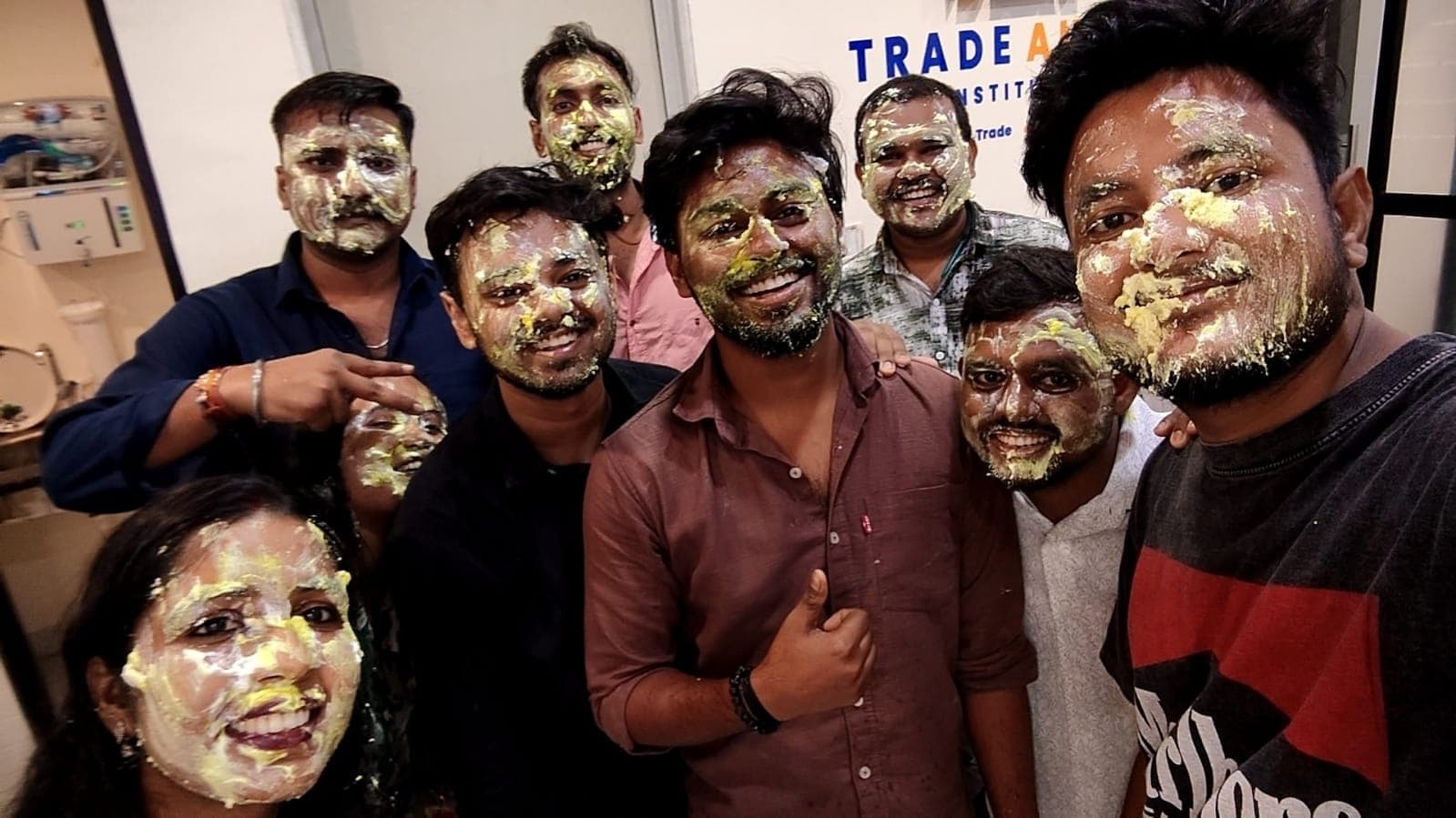 Birthday celebration with balloons and decorations at TradeAura Institute