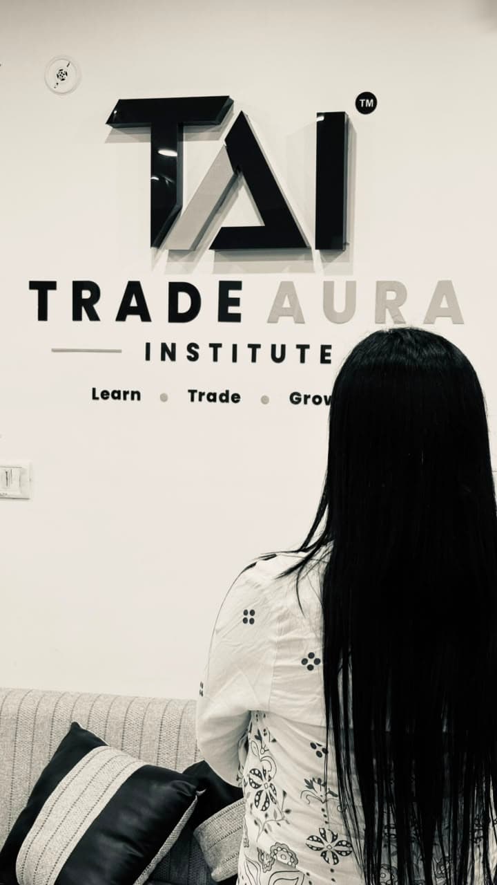 TradeAura Institute campus and faculty at work on the learning floor