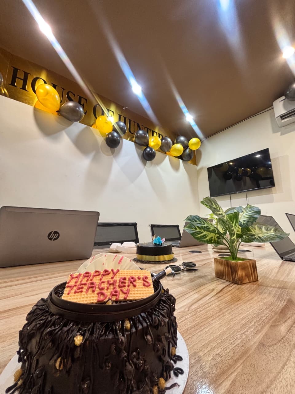 TradeAura Teacher's Day celebration with decorations and students